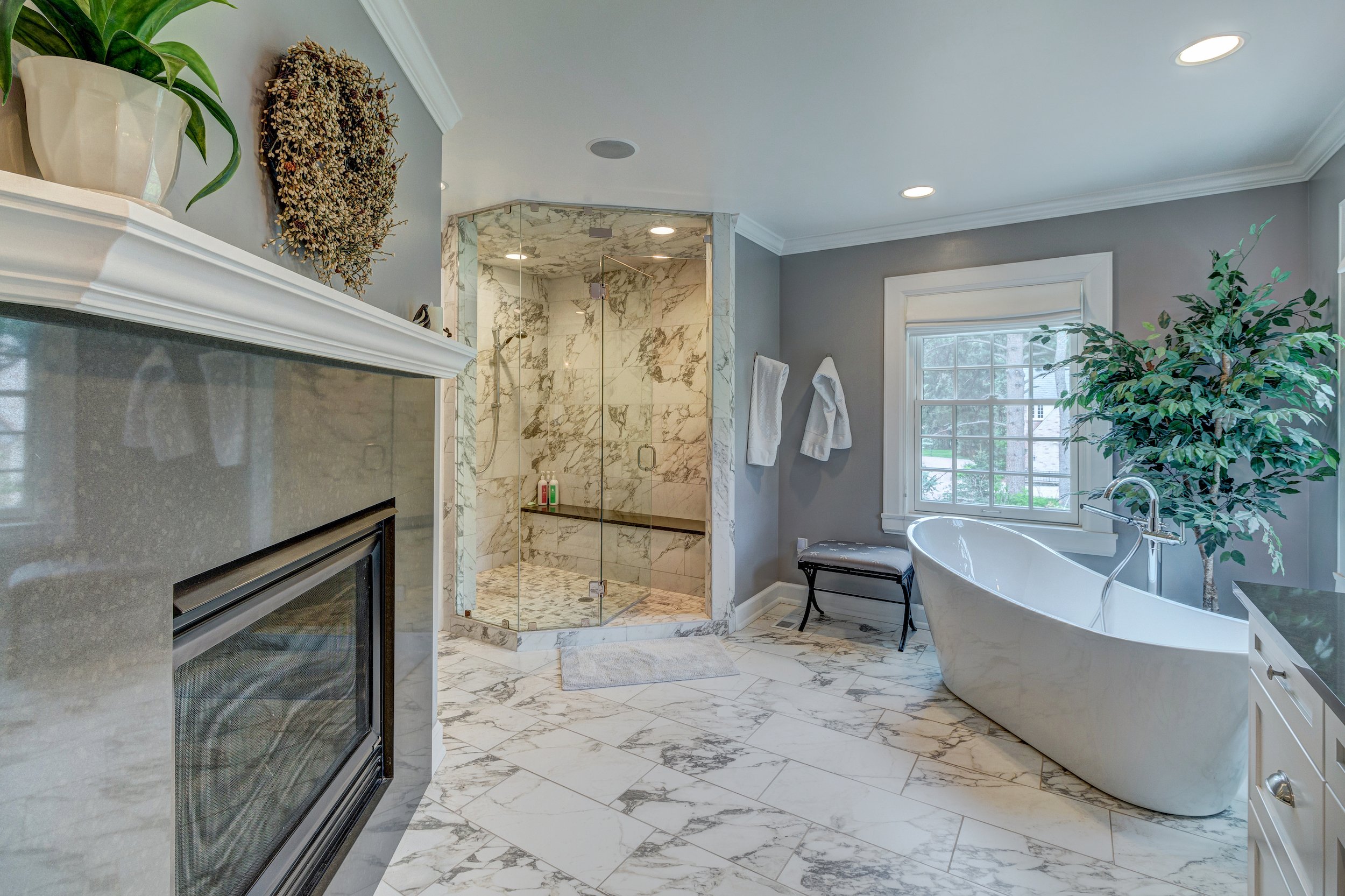 33-View of steam shower and FP in master bath.jpg