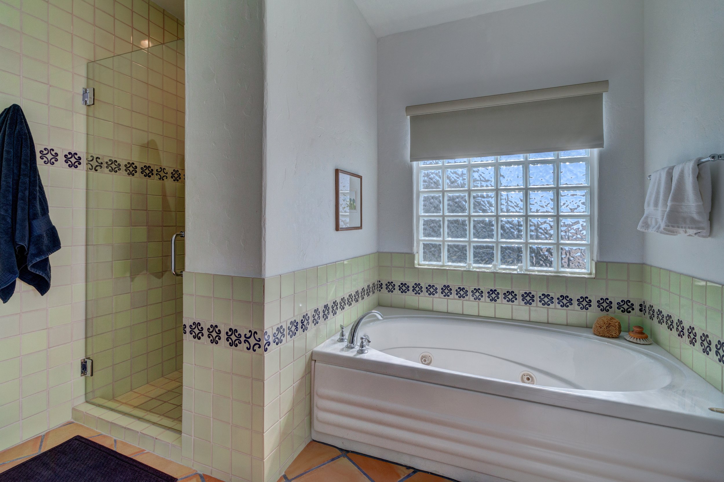 38-Tiled shower + jetted tub in the master bath.jpg