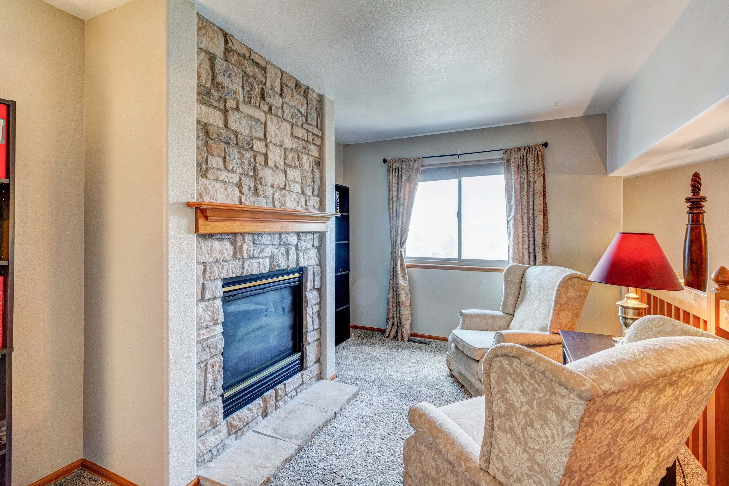 21b-Sitting area in master w fireplace.jpg