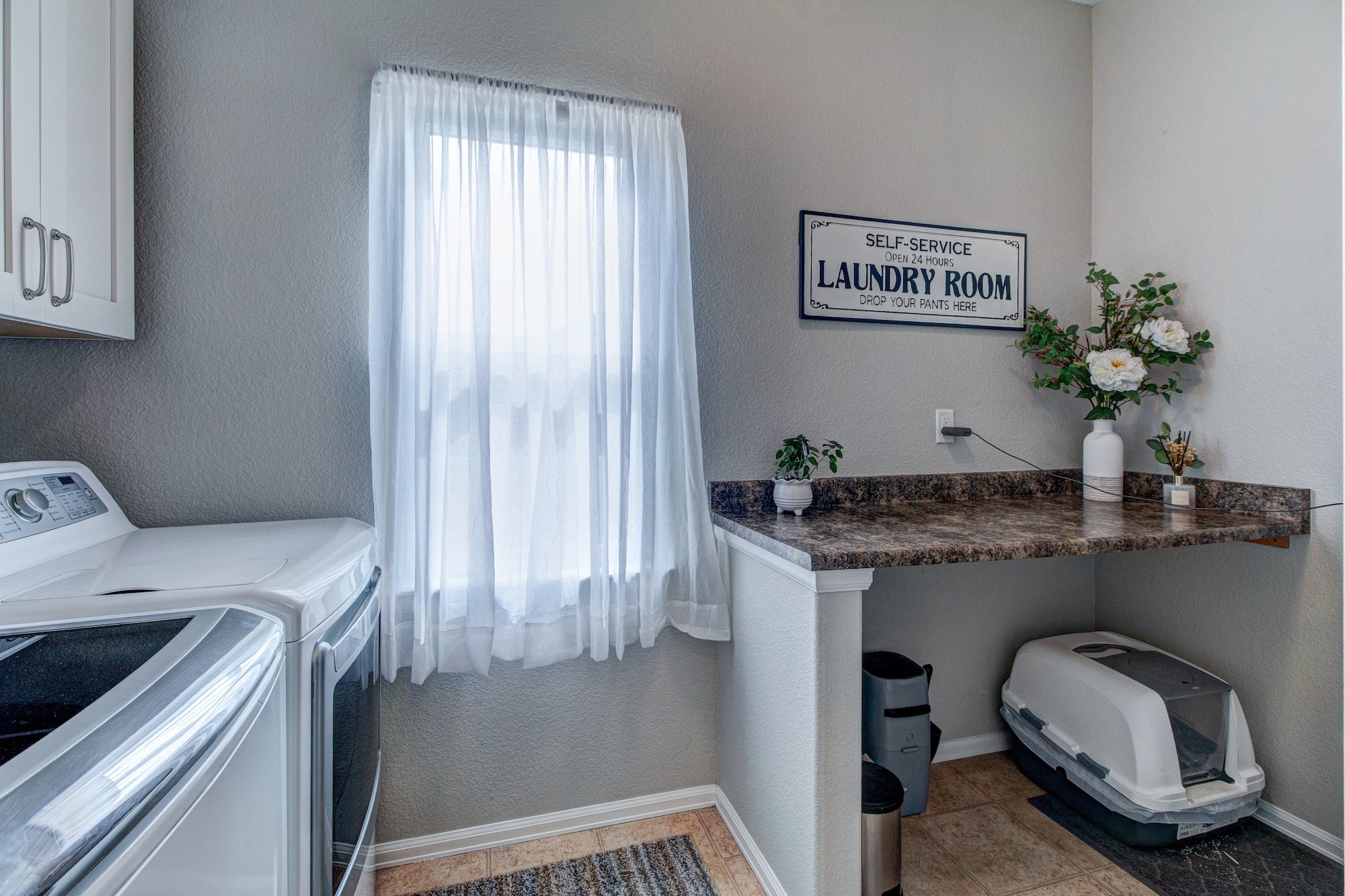 15-Laundry room w convenient folding bench.jpg