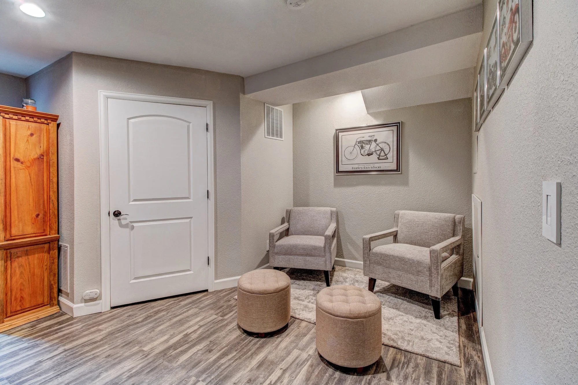 16-LL rec room accesses the utility room w storage.jpg