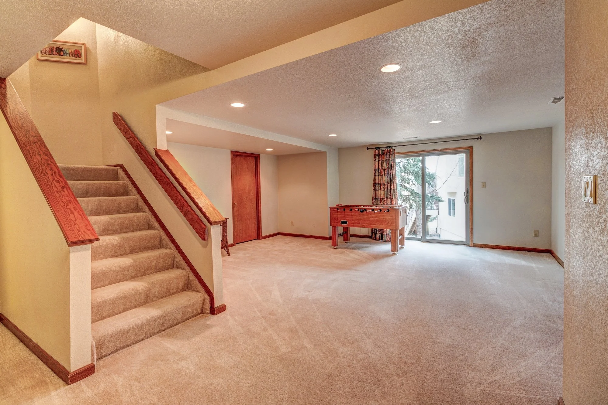 30-LL rec room w walk out.jpg