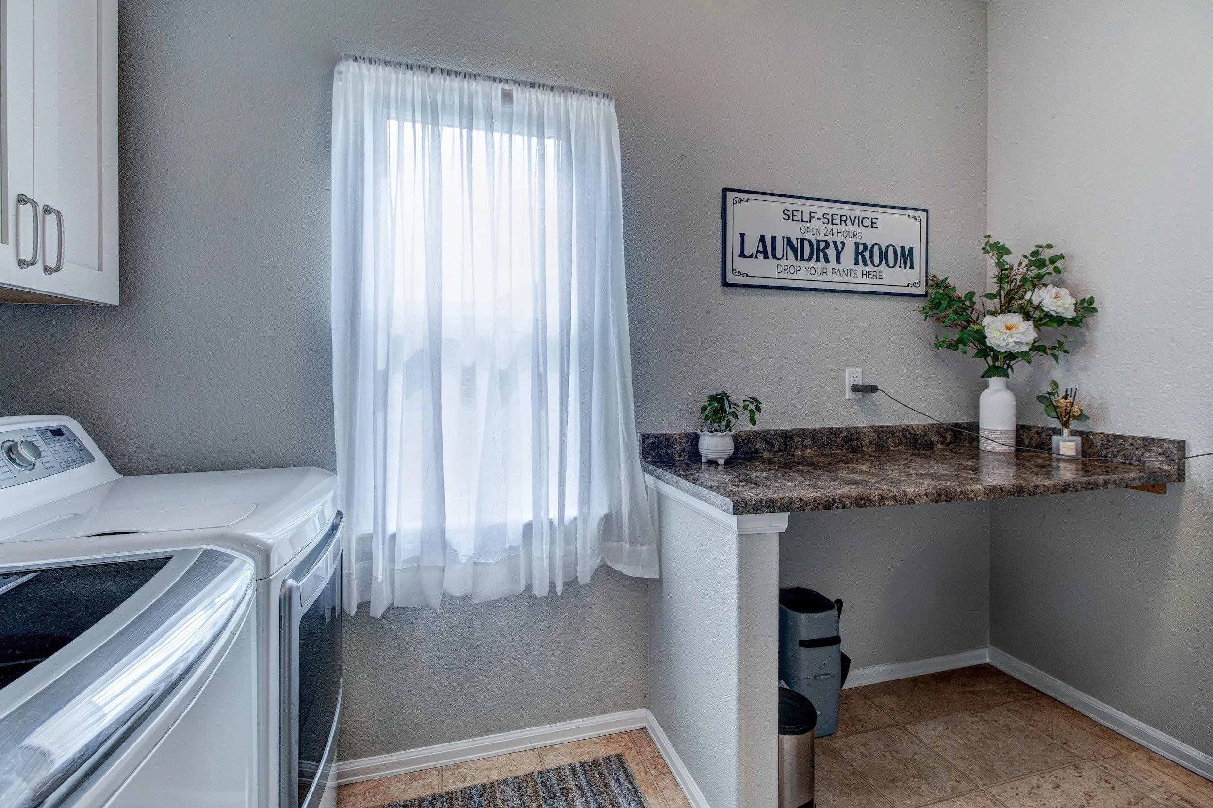 15-Laundry room w convenient folding bench-2.jpg