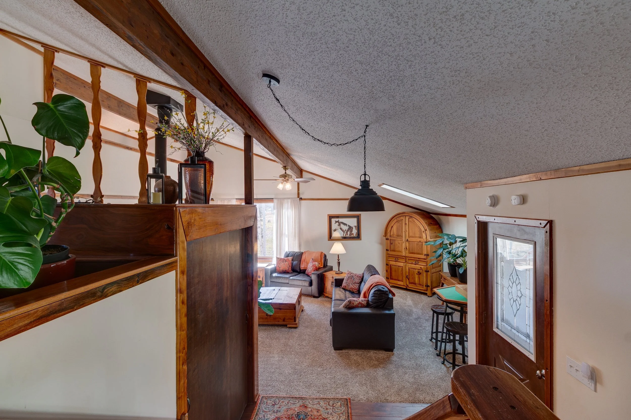 7-Entry w coat closet + wide plank floors.jpg