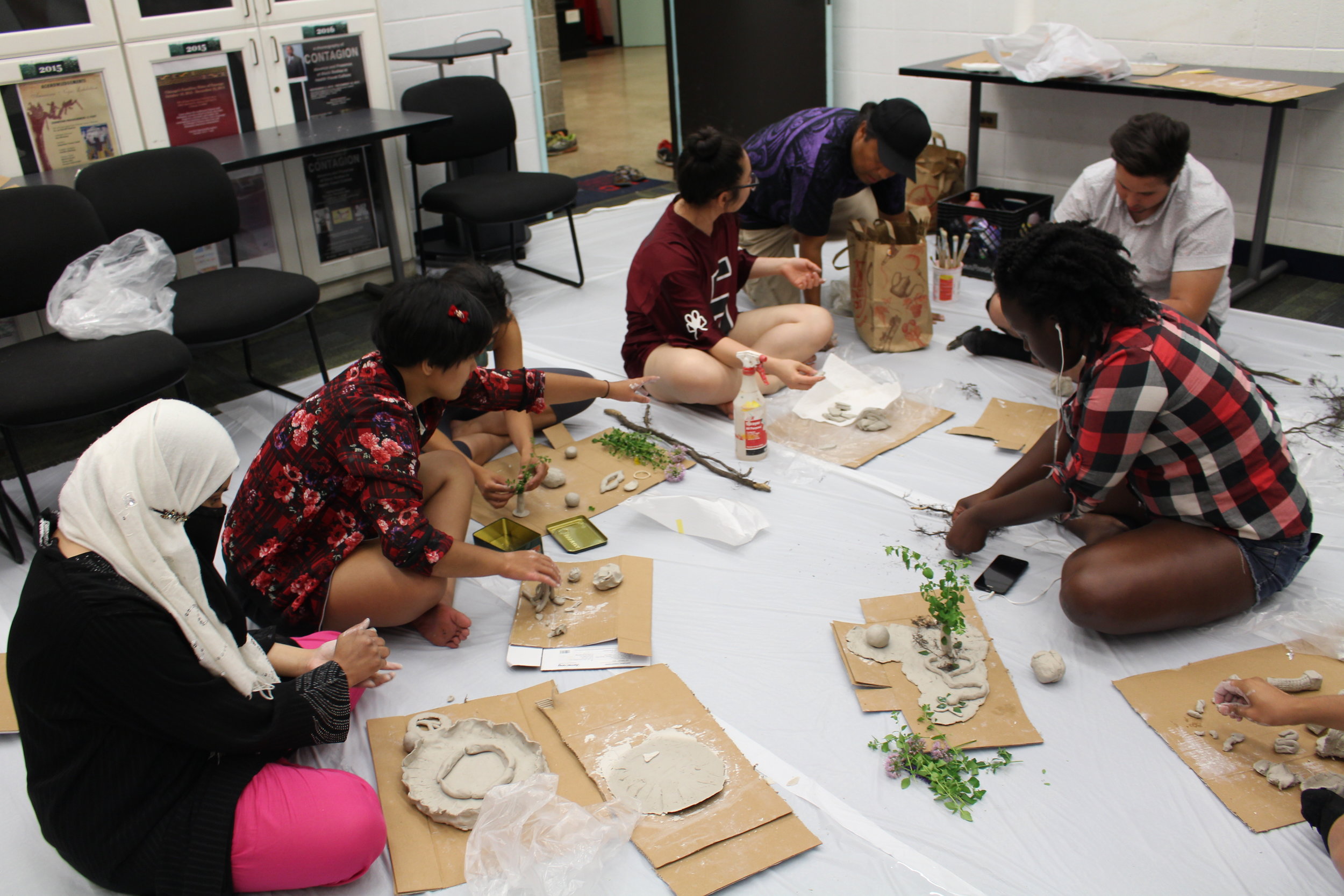 Picture of Heritage Gardeners working on clay sculptures