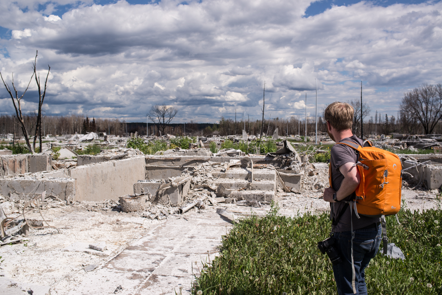  “Dude, where’s my house?” Peter Fortna looking at the remnants of his house burnt down in the Fort McMurray wildfires, July 2016. 