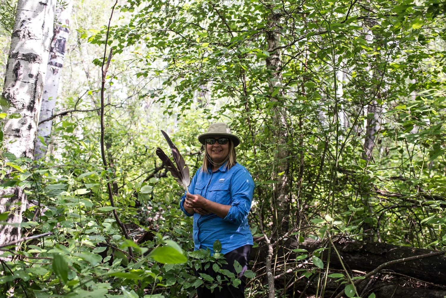 Carmen Wells collecting eagle feathers, July 2017.