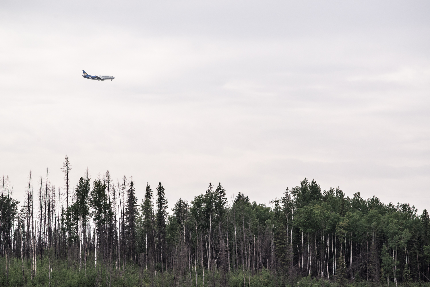 Airplane approaching the Canadian Natural Resources Limited Horizon Mine, July 2017.  