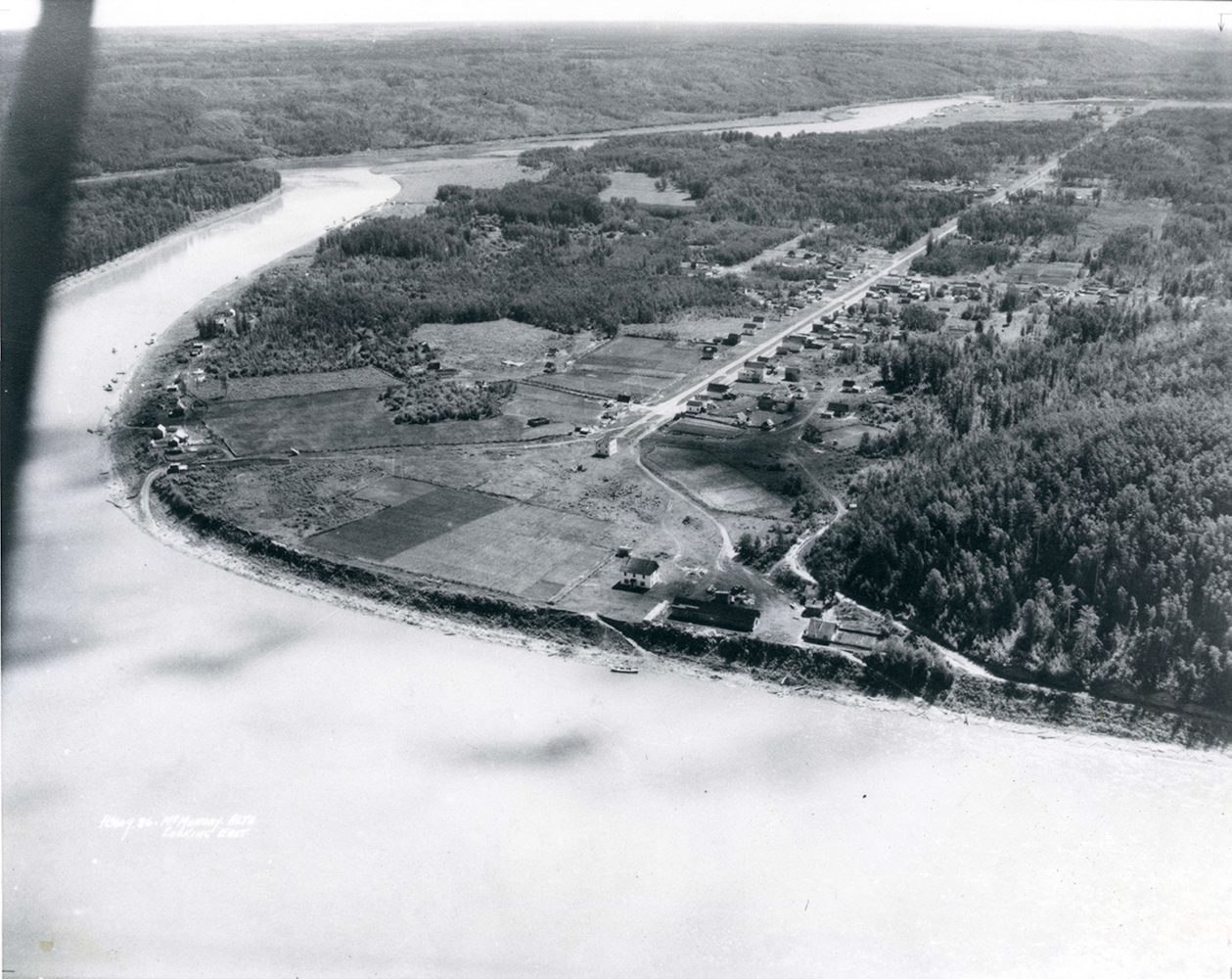  A view of the Snye and Moccasin Flats dwellings (on river bend at left), 1930.