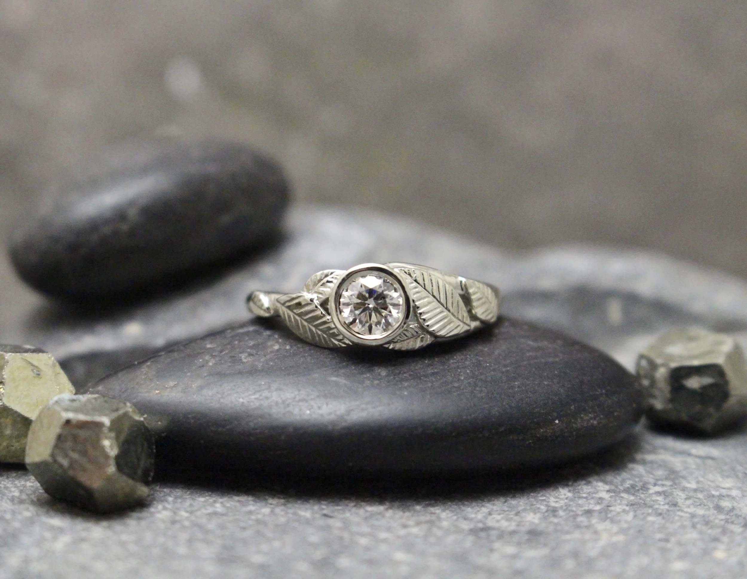 14 karat White Gold Leaf Ring with .5CT White Diamond