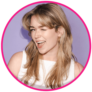 Headshot of Laura Whitehouse giving us a cheeky comedic wink