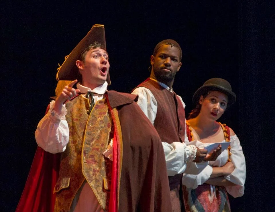 DeMar singing onstage