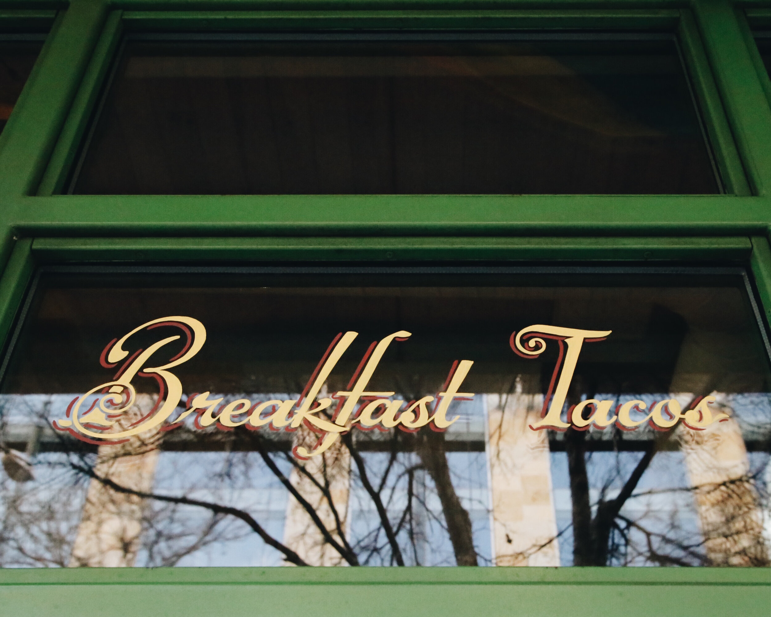  Breakfast taco decal on a window at Downtown Jo’s. 