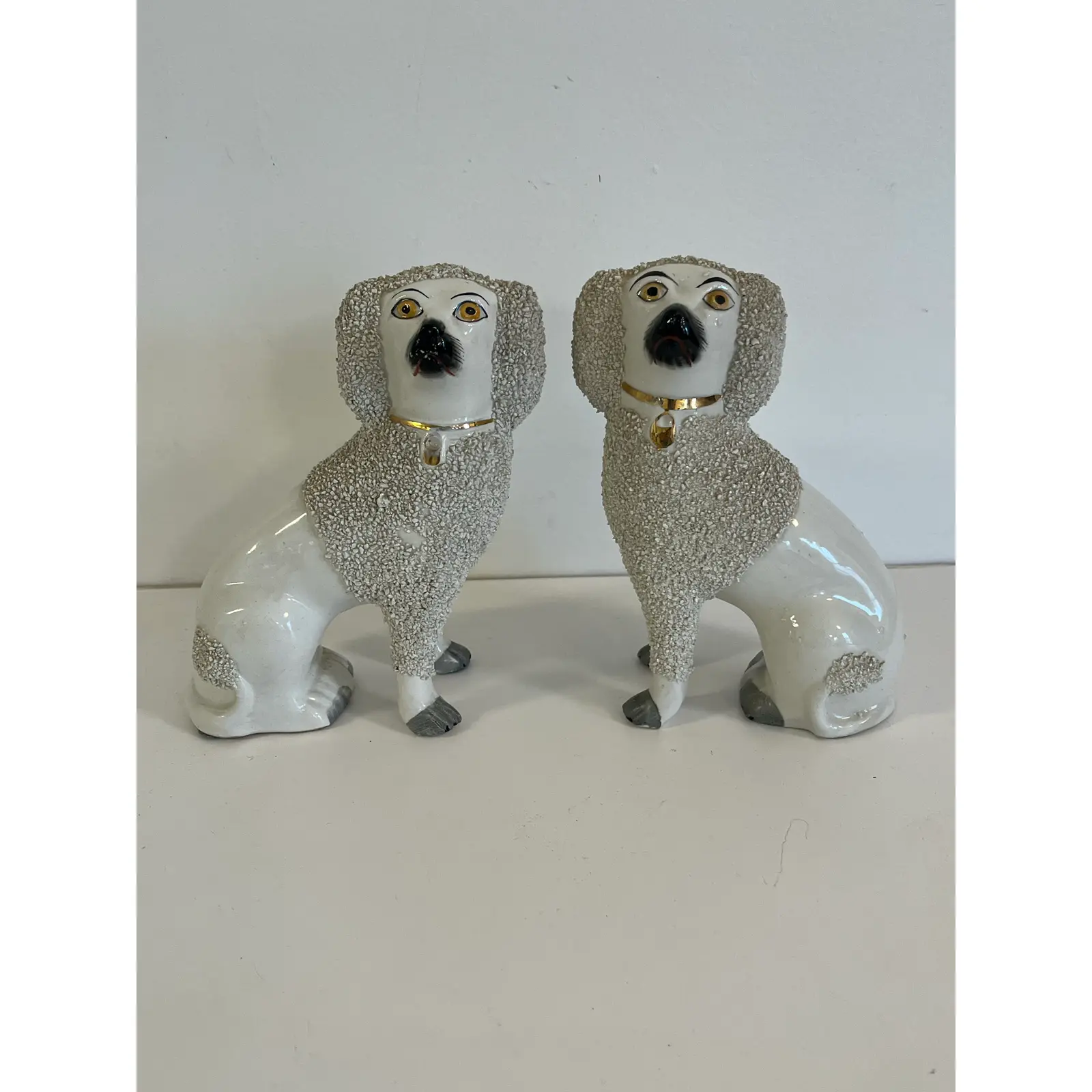 late-19th-century-pair-of-staffordshire-pottery-poodle-dog-figures-2754.jpg