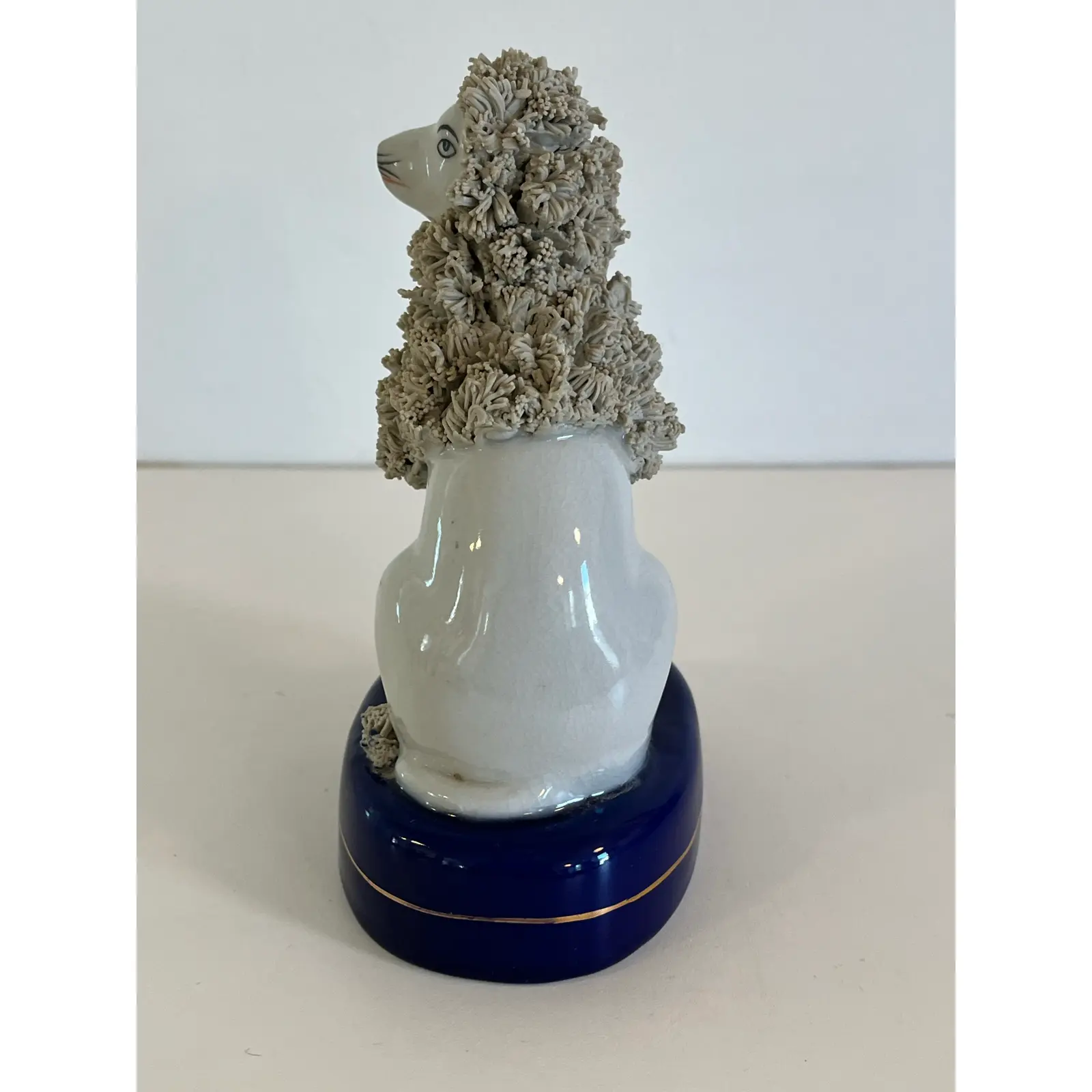 antique-seated-staffordshire-porcelain-poodle-7388.jpg