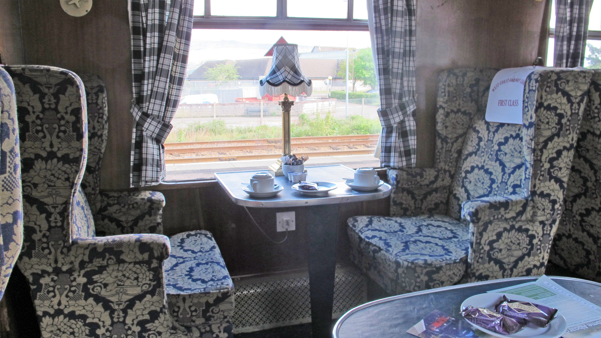 First Class service on the Jacobite takes you back to a bygone era of travel. There are today two First Class coaches on the train, this open coach at the front of the train... 