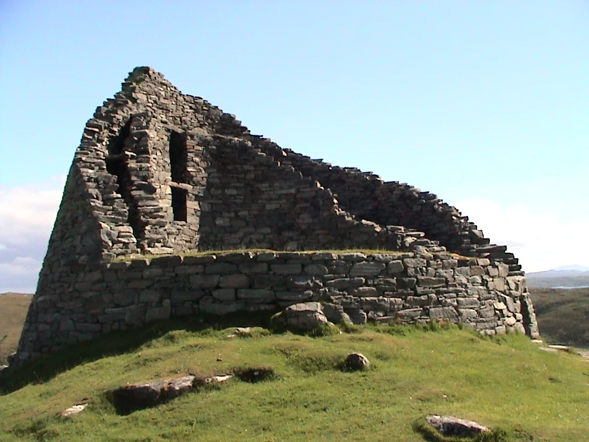 From Wikipedia: Dun Carloway ( Dùn Chàrlabhaigh ) is a broch situated in the district of Carloway , on the west coast of the Isle of Lewis . It is a remarkably well preserved broch - on the east side parts of the old wall still reach to 9 metres tall.