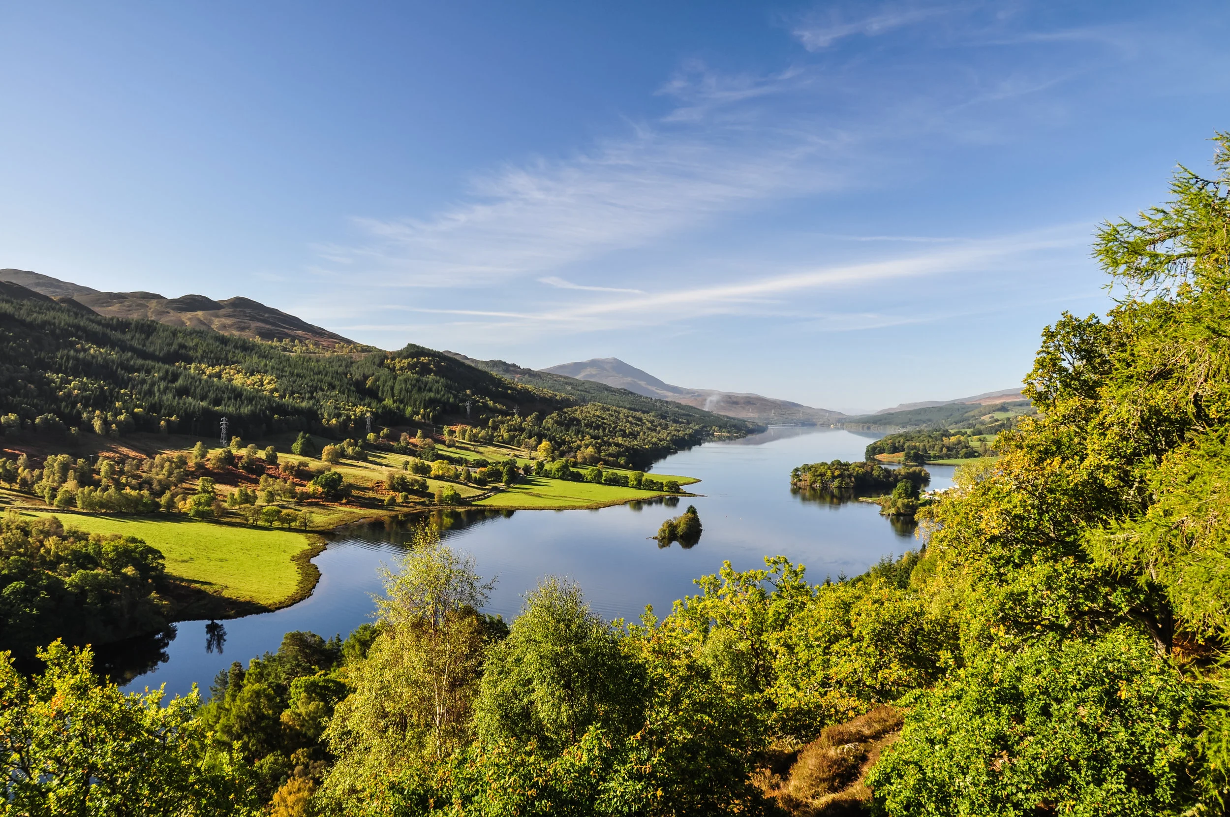 Beautiful summer view across Loch (Lake) Tummel seen from Queen's View, a famous viewpoint. Located near Pitlochry, Perthshire, Scotland, UK. Perthshire is the region of Scotland that has been home to Dougie MacLean since his birth.