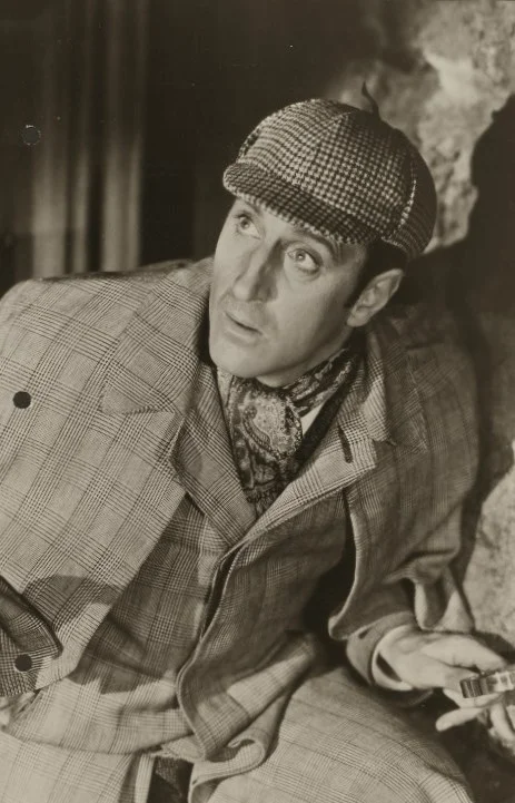 Basil Rathbone is considered by many to be the quintessential Sherlock Holmes and it was he who adopted the Deerstalker cap and Inverness cape as an iconic part of Sherlock's wardrobe.