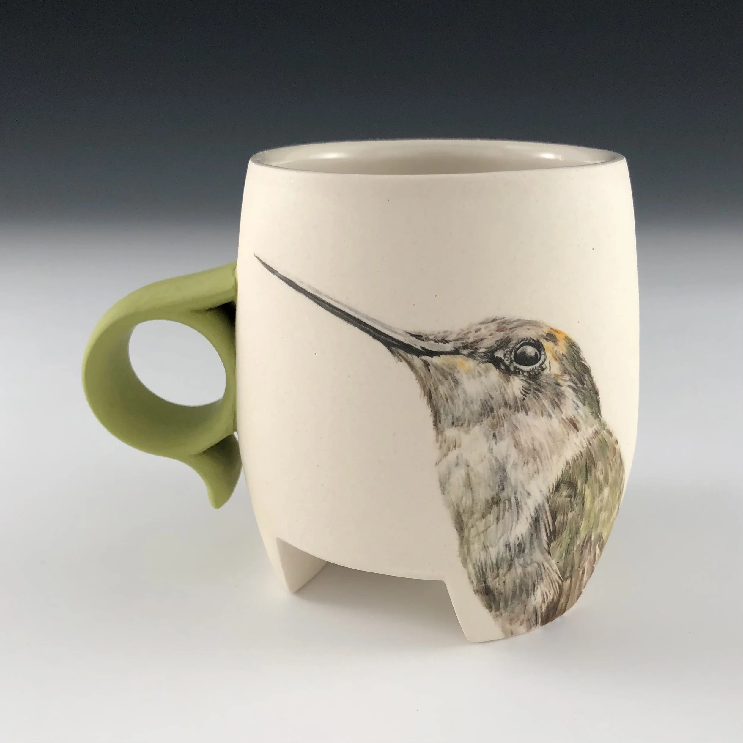 Underglaze painting of hummingbird 