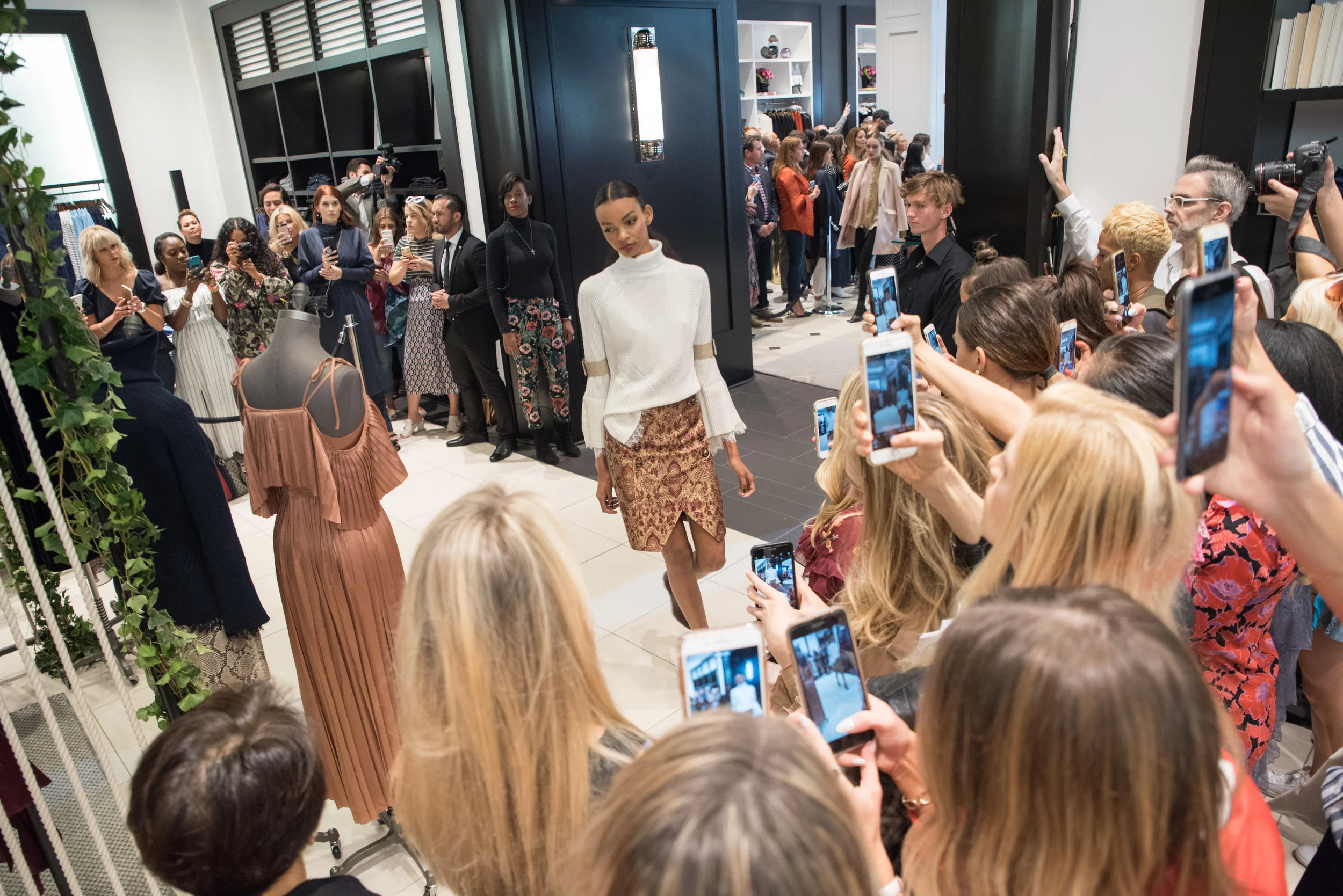 Runway show through the Banana Republic store