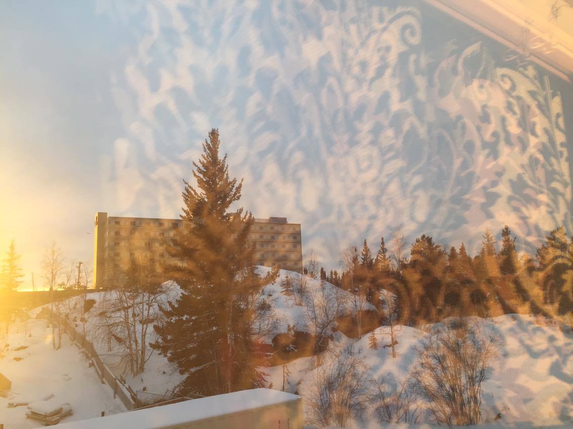 Something of beauty in her day. "..a quick snap where I noticed a reflection through my studio window, caused by the sun setting (at 3pm!), creeping towards the near 24hour winter darkness we experience here in the North."