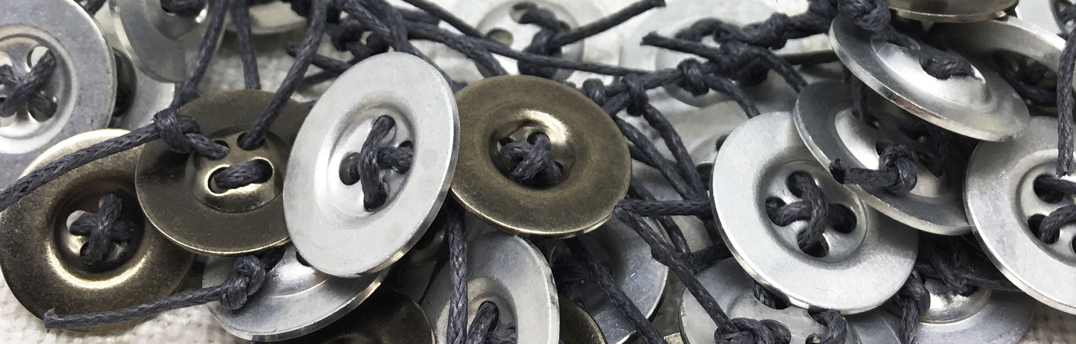 neckpiece close up aluminium buttons.jpg