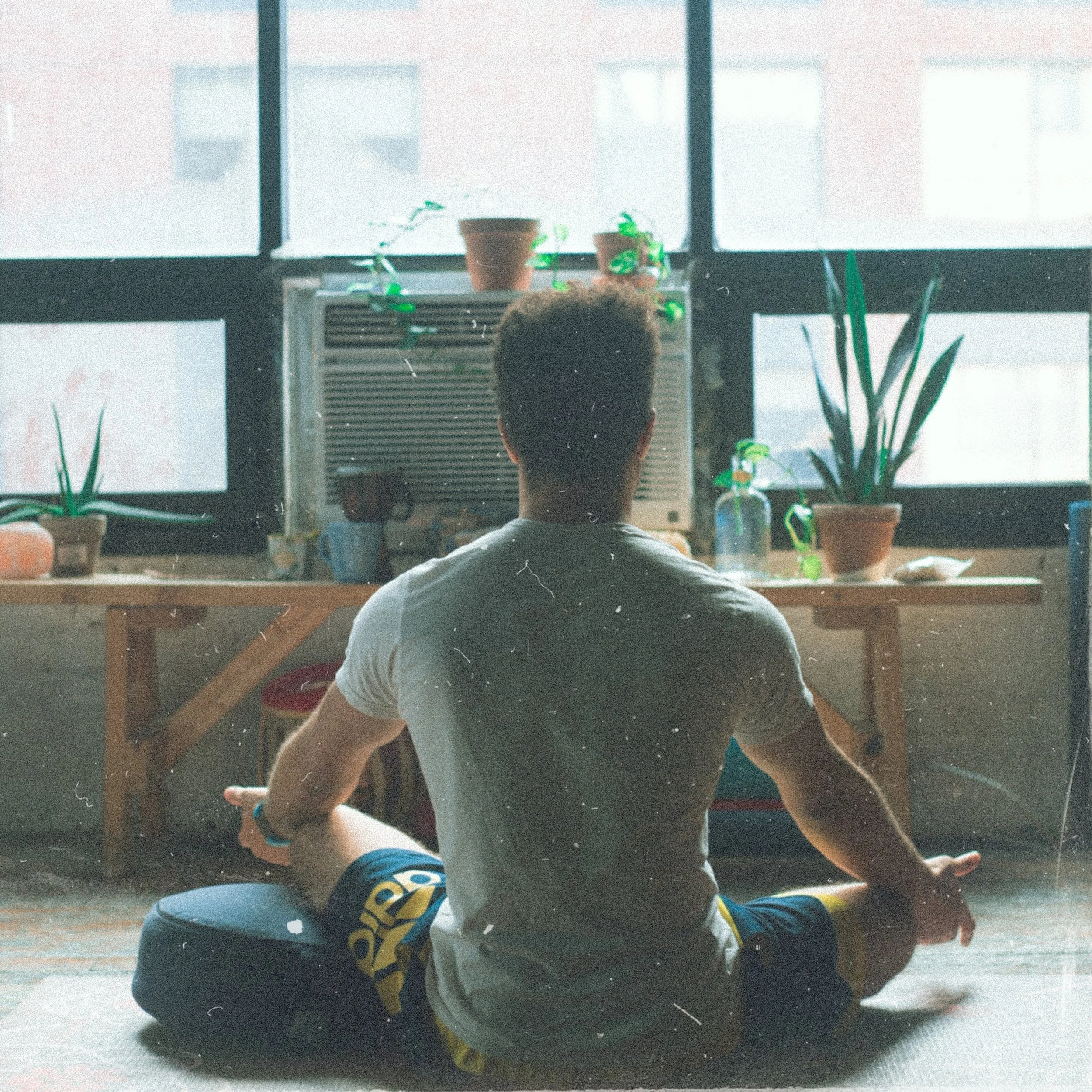 polyamorous guy meditating