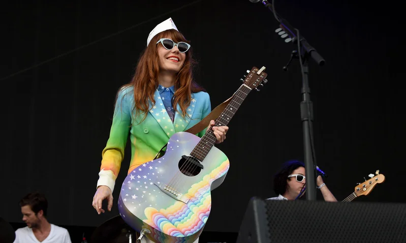 Jenny Lewis' wardrobe radiates colorwonder at her Forecastle Festival 2014 performance, photograph by Tyler Stewart
