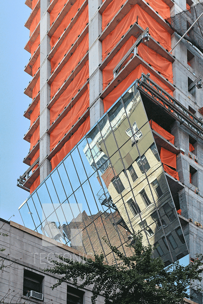 Glass facade on the underside of the cantilever