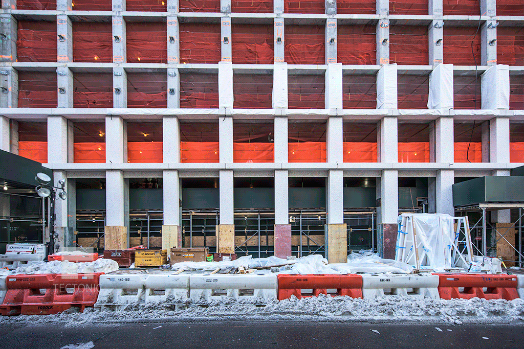 Facade installation at the base of the building