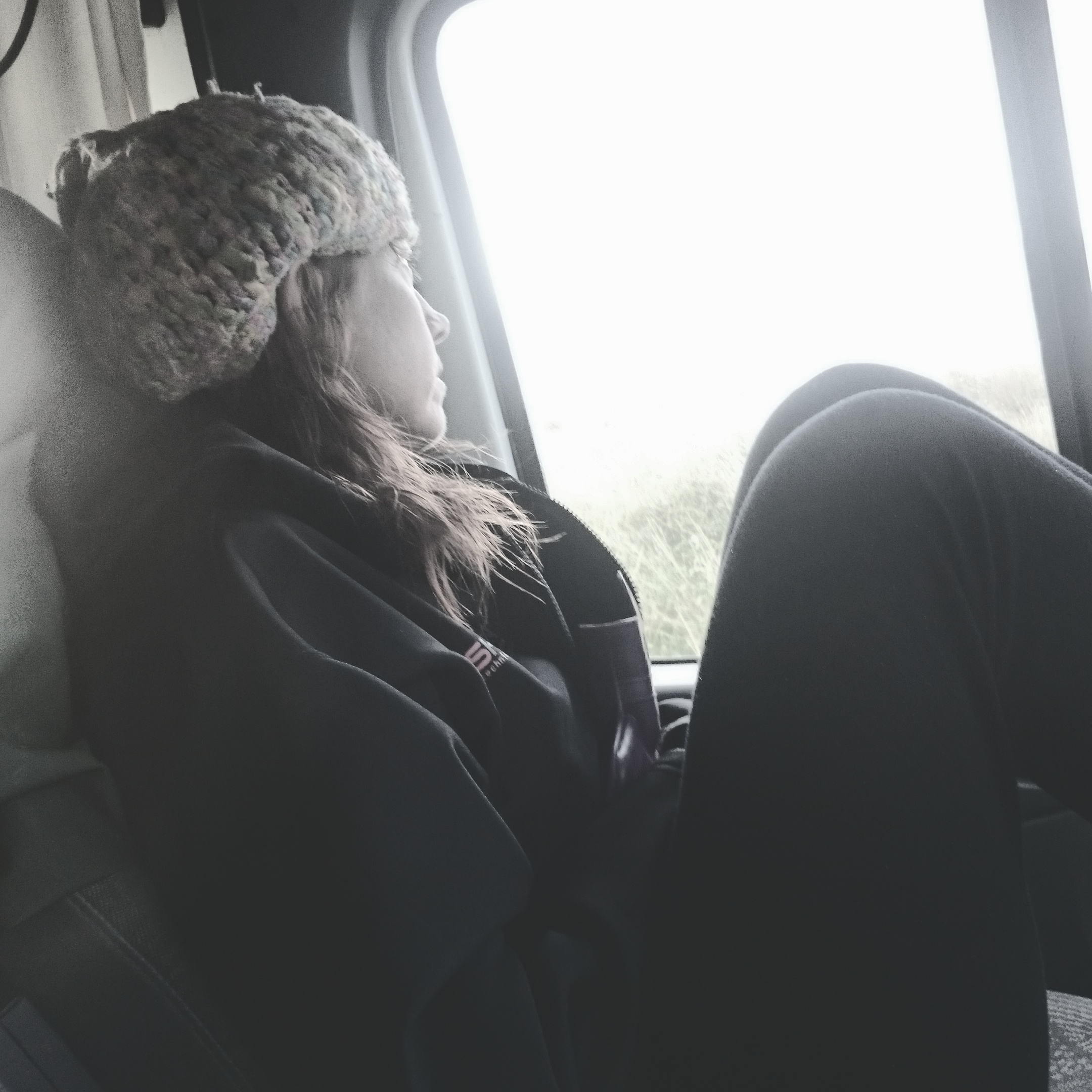 Red staring out the window, pensive while warming up 