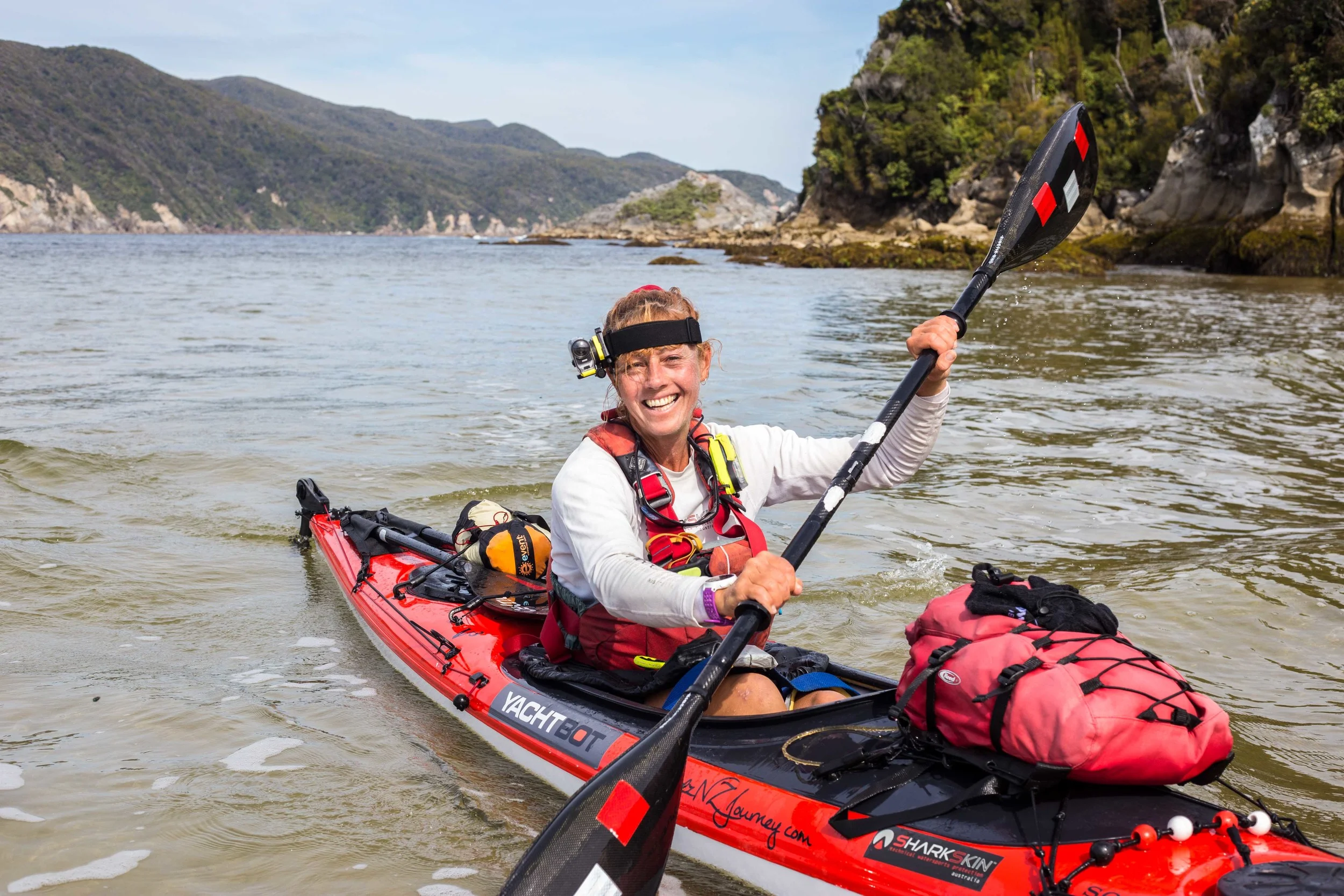 A happy Red paddling into Doughboy Bay