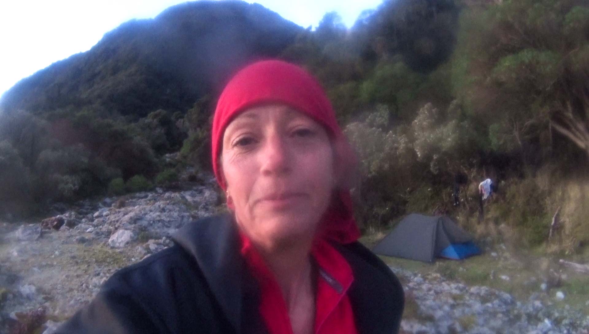 Happy Red at campsite in Bligh Sound