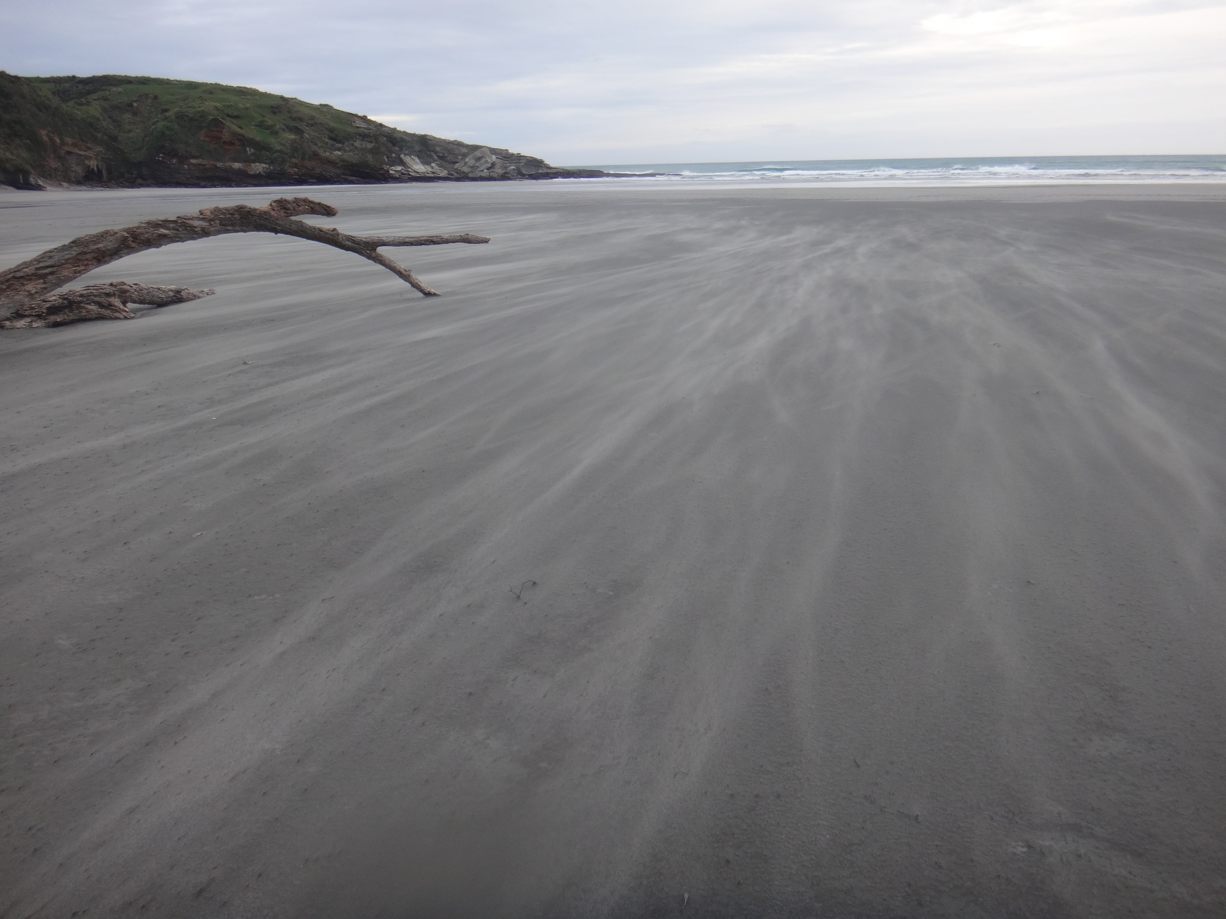 Flying sand.
