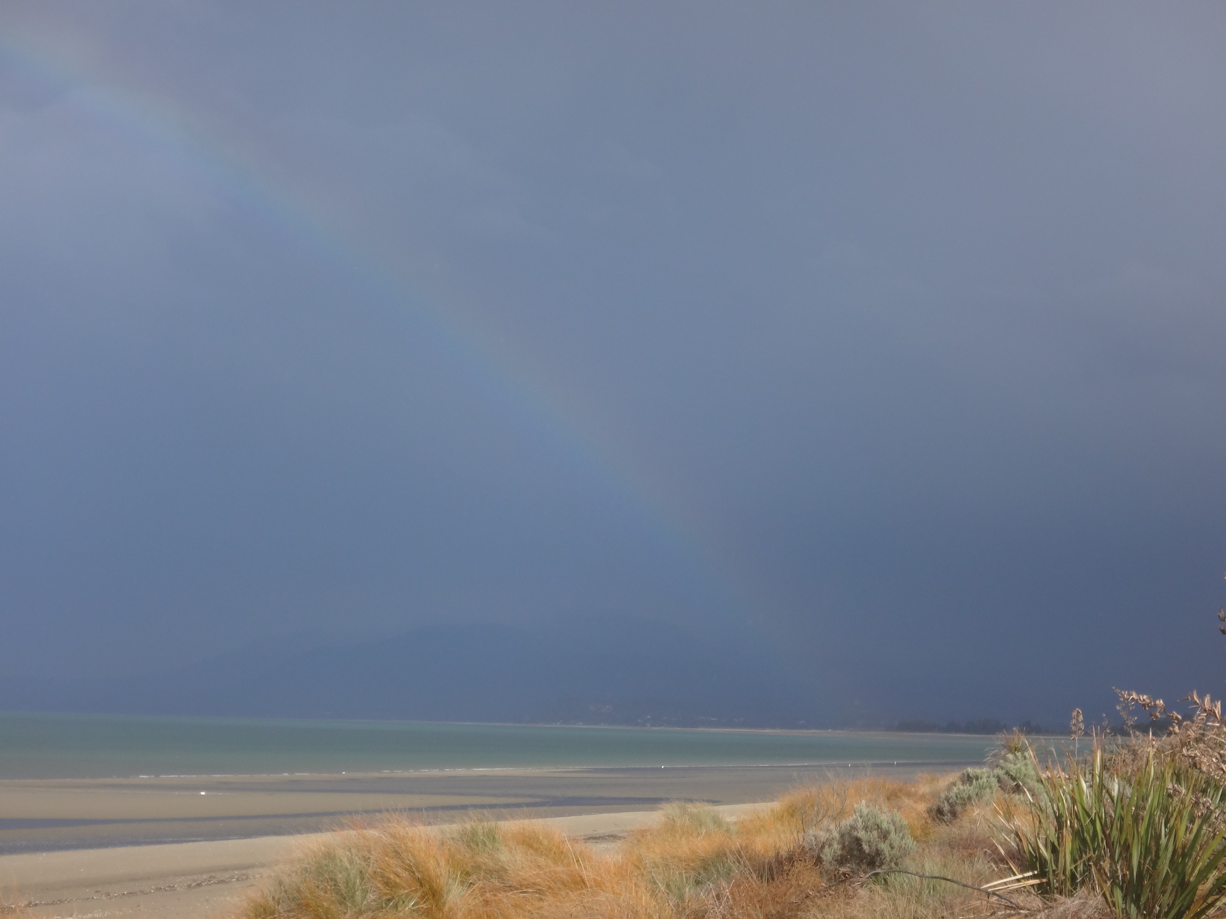 A Glimmer of a Rainbow just as it fads away.