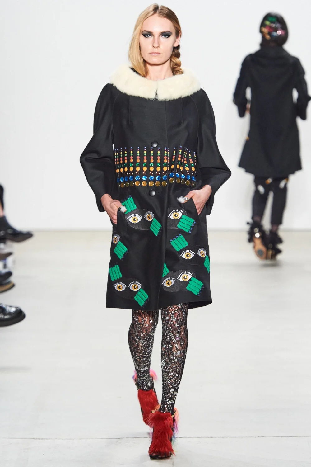 Fur collared coat with embroidery. Libertine