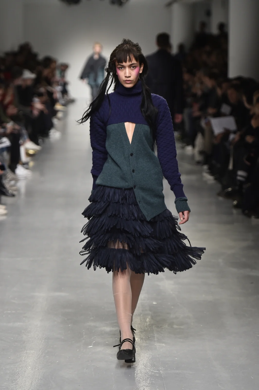 Heavily featured the beloved cardigan.