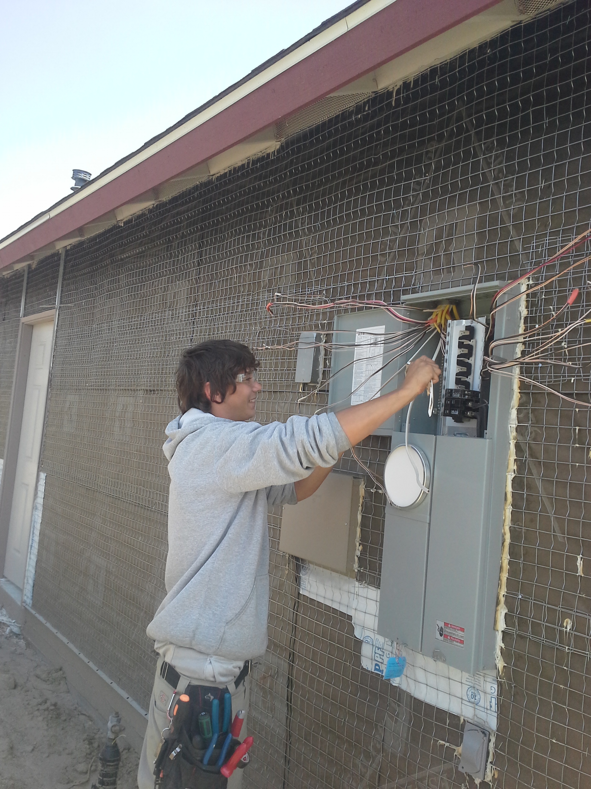 Jaime Estrade doing work at electrical panel-5-7-15.jpg