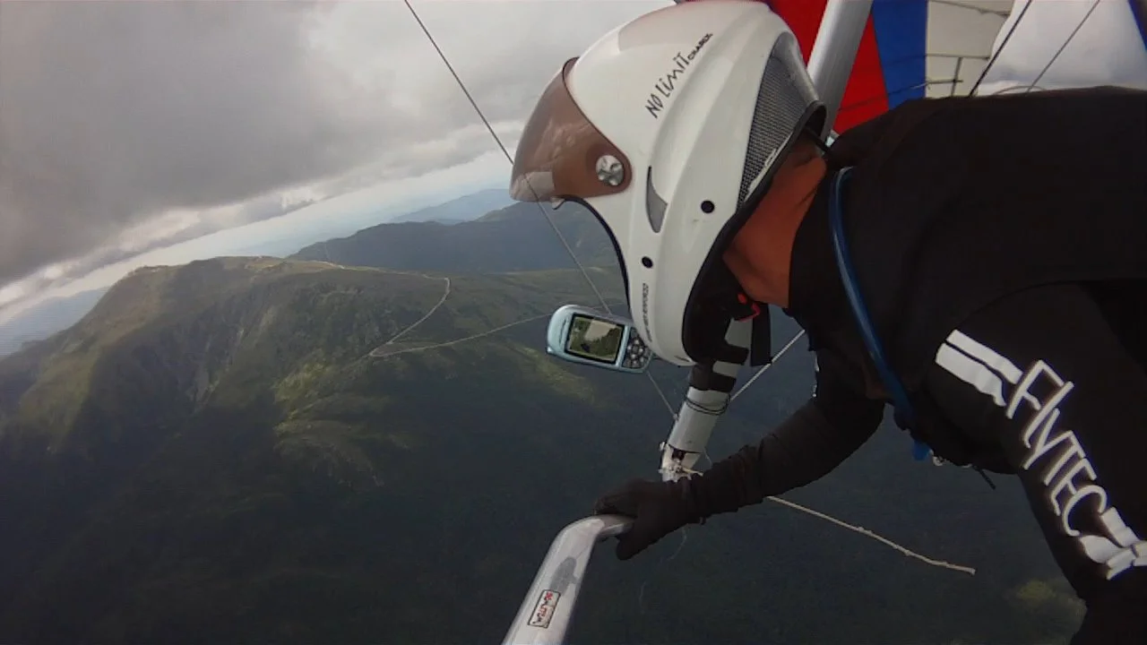 Scraping clouds - overlooking Mt Washington in New Hampshire from my Hang-Glider @ 7000 ft (2136m). My favorite flight.