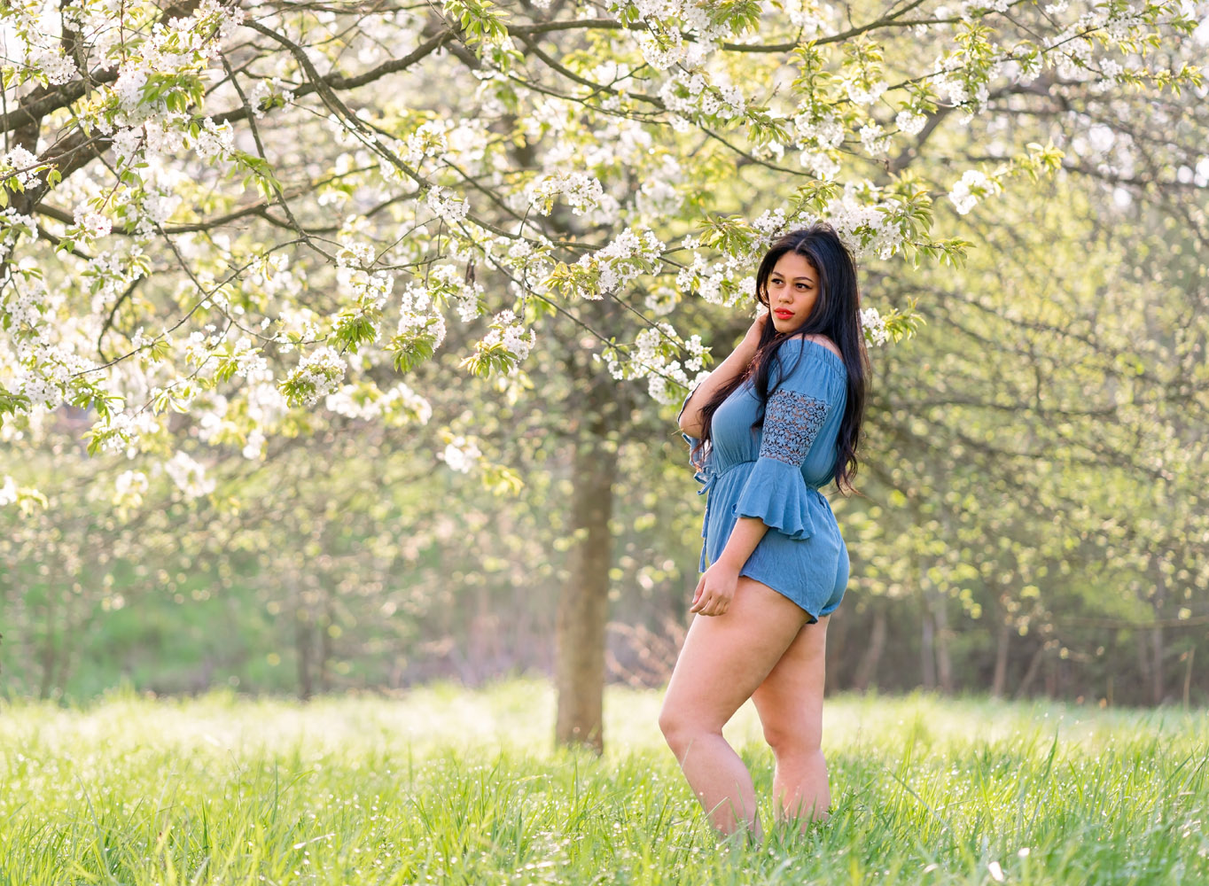  kaiserslautern Ramstein KMC Photographer beauty and portrait photography in Reichenbach-Steegen, Rheinland-Pfaly Germany. Beauty Portrait in Spring with beautiful dark hair girl in blue romper and white Cherry blossoms by Sarah Havens 