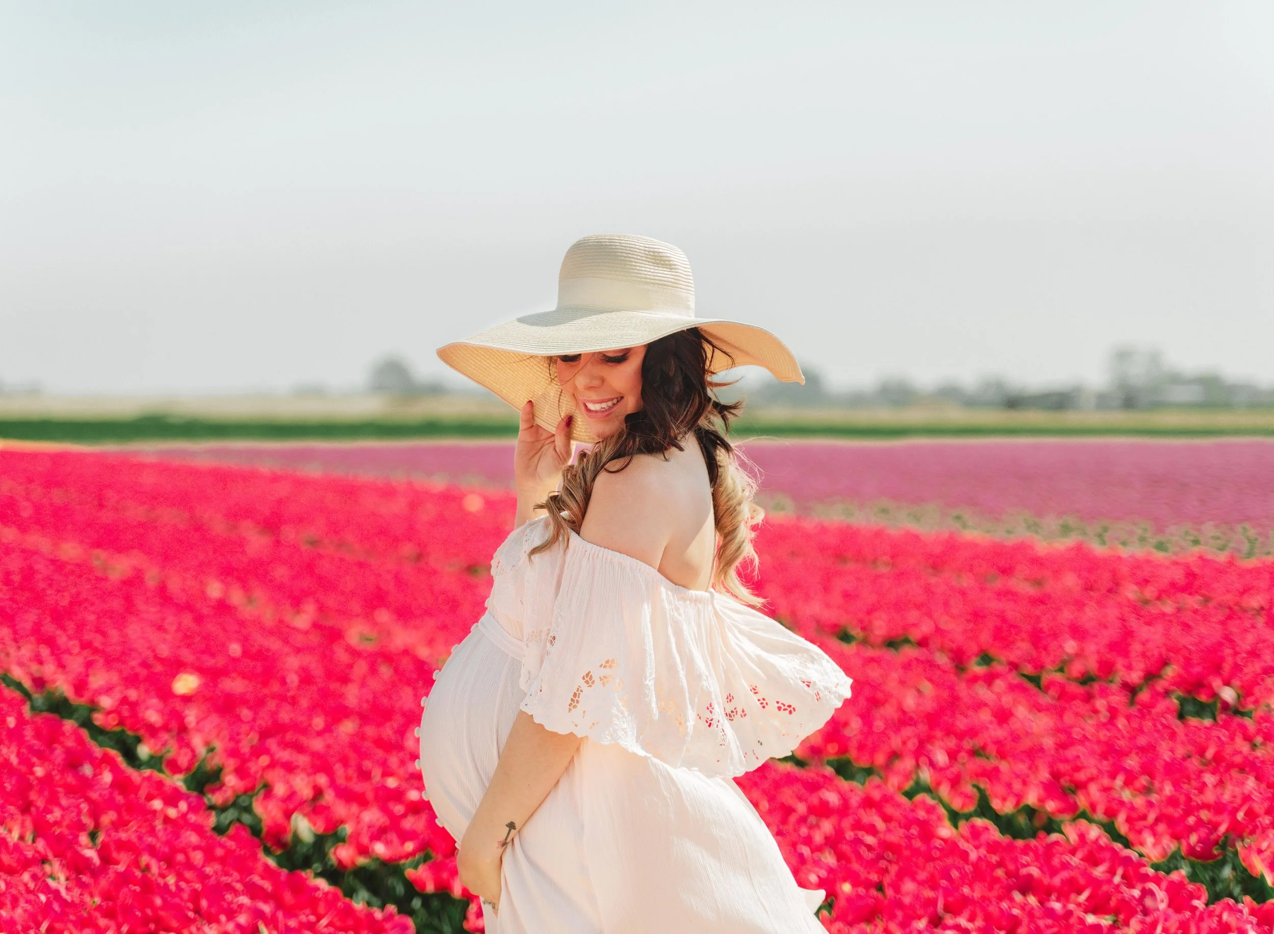ramstein kmc maternity photography in tulip fields in Netherlands