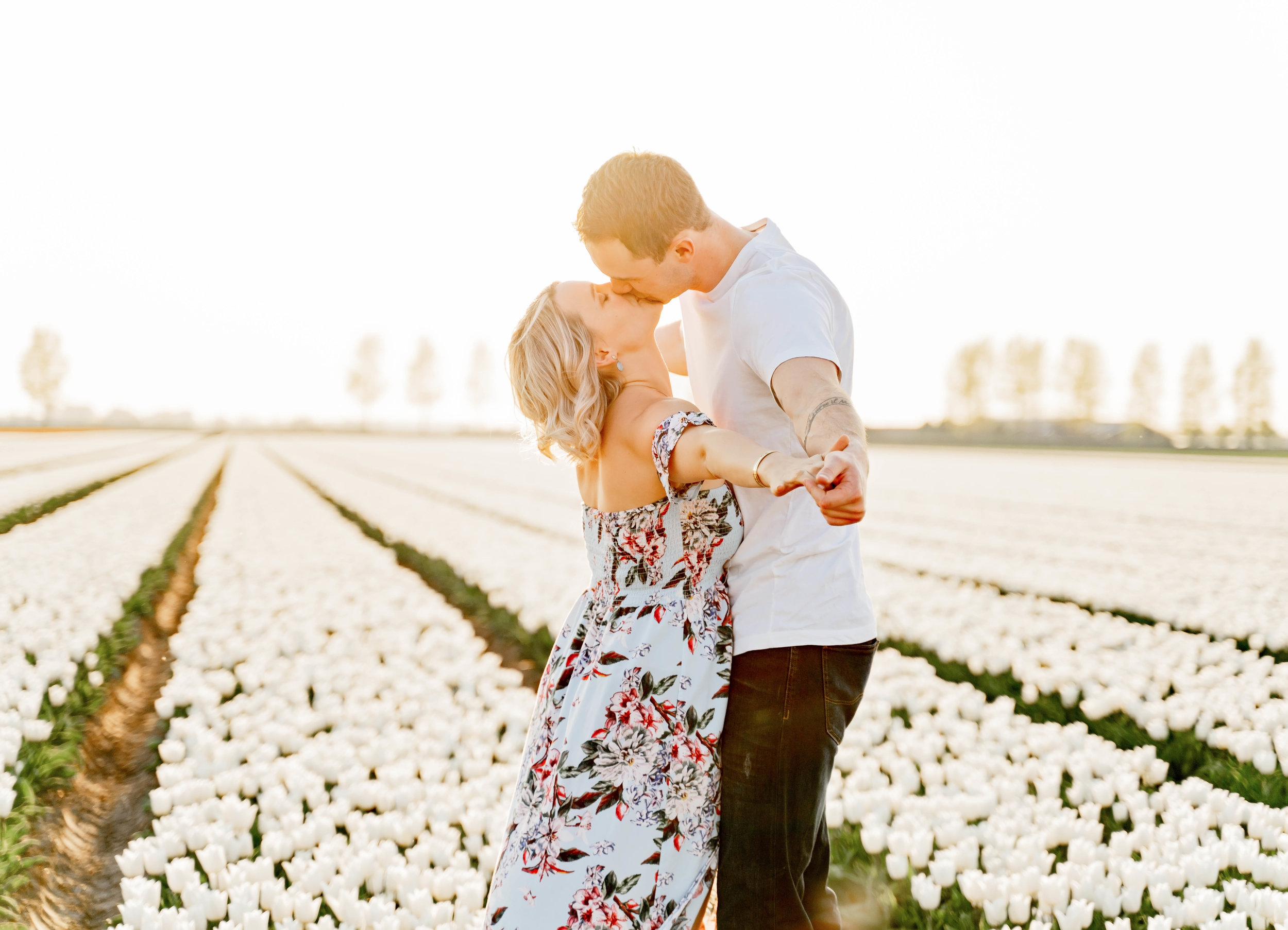  engagement session having a destination foto shoot with a couple in the Netherlands in the tulip fields by kmc photographer sarah havens 
