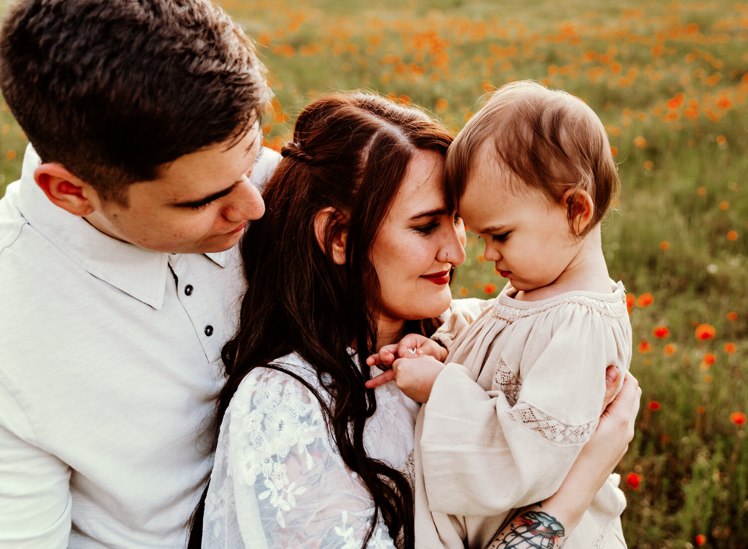 young-family-with-baby-girl-palying-in-poppy-flower-field-in-ramstein-family-photographer-sarah-havens-kaiserslautern-germany (3).jpg