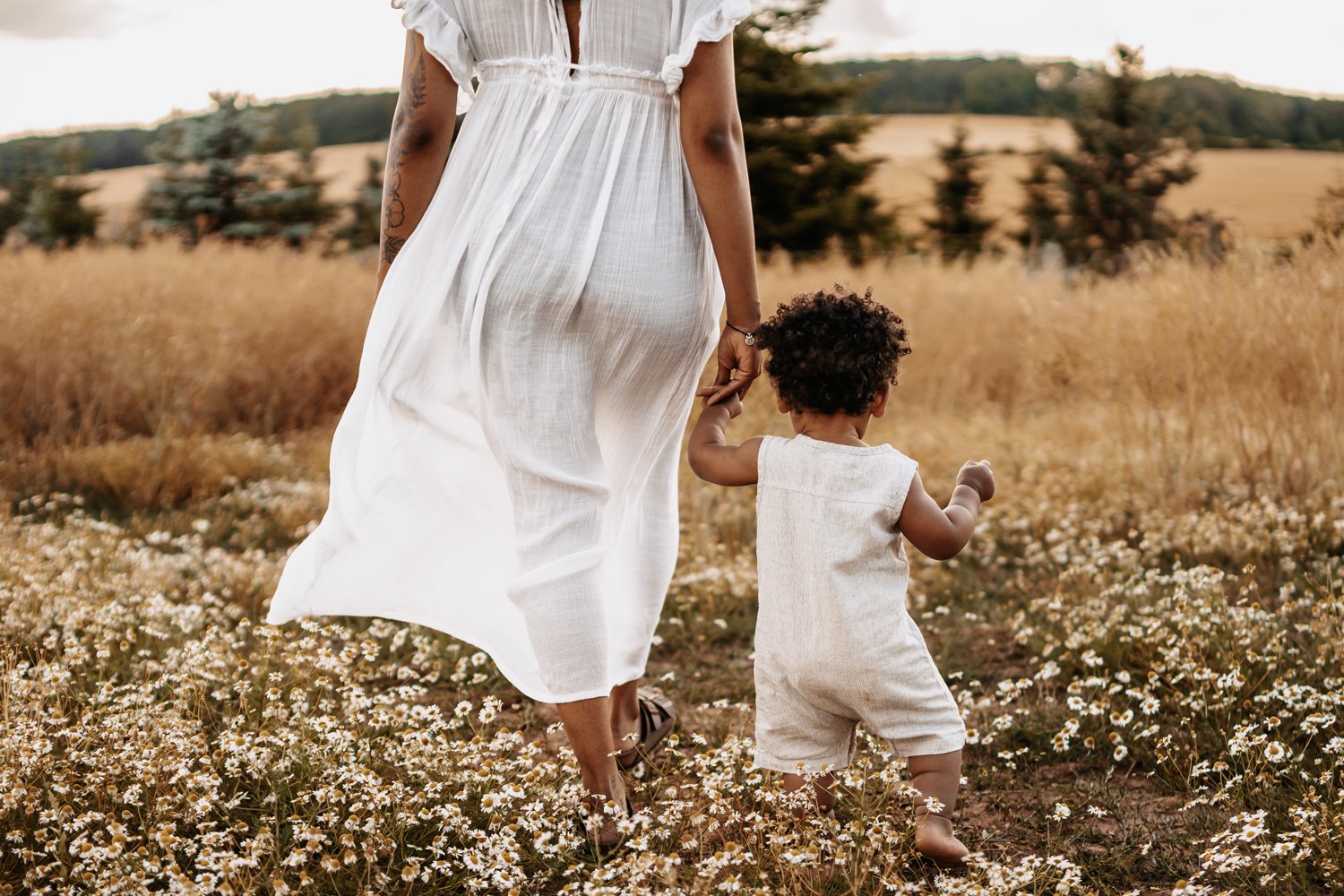 emotive-motherhood-photography-young-mother-with-toddler-barfoot-in-fields-at-sunset-in-ramstein-germany-sarah-havens (16).jpg