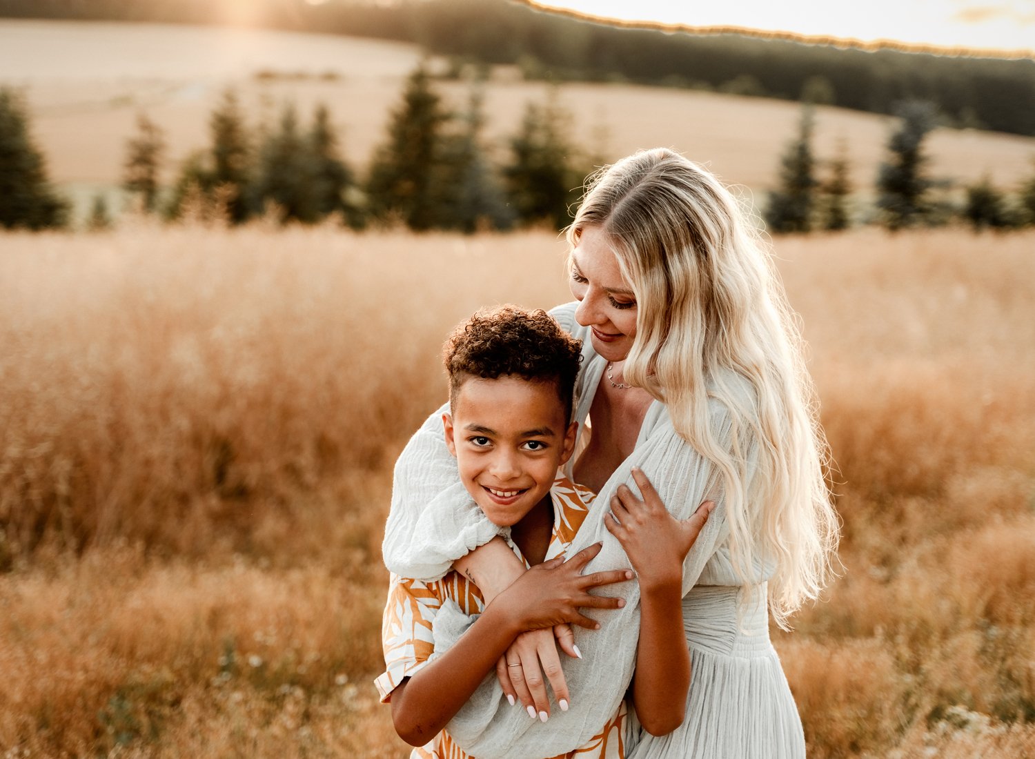 emotive-storytelling-summer-session-of-young-mixed-family-with-young-kids-at-sunset-in-german-country-side-in-ramstein-kmc-by-sarah-havens (2).jpg