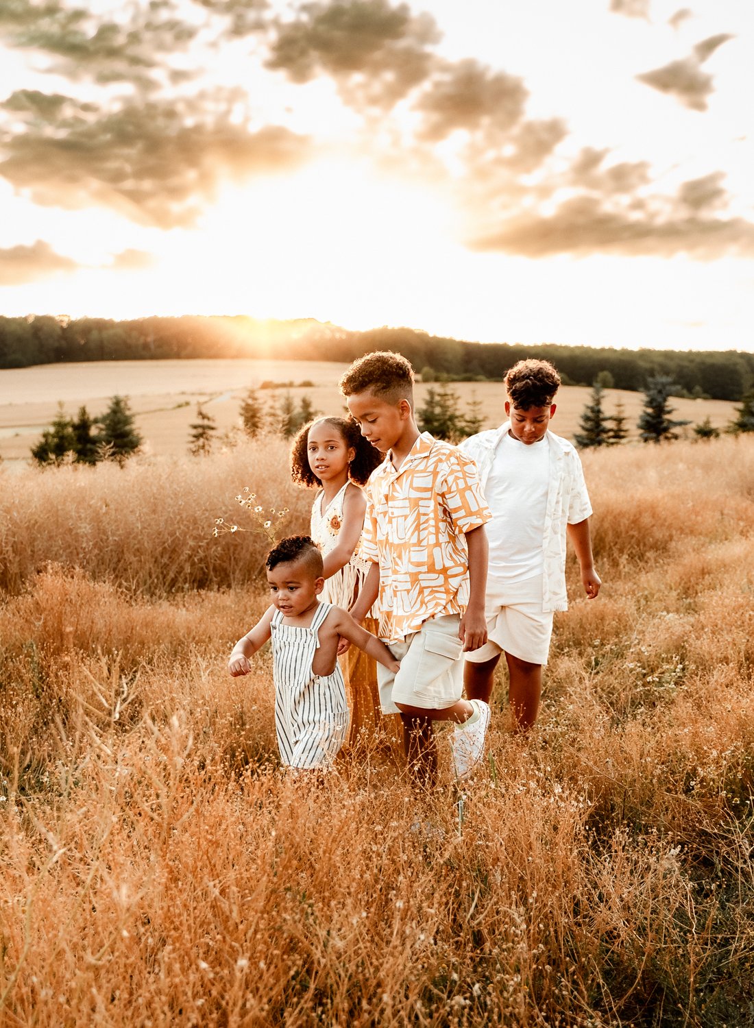 emotive-storytelling-summer-session-of-young-mixed-family-with-young-kids-at-sunset-in-german-country-side-in-ramstein-kmc-by-sarah-havens (4).jpg