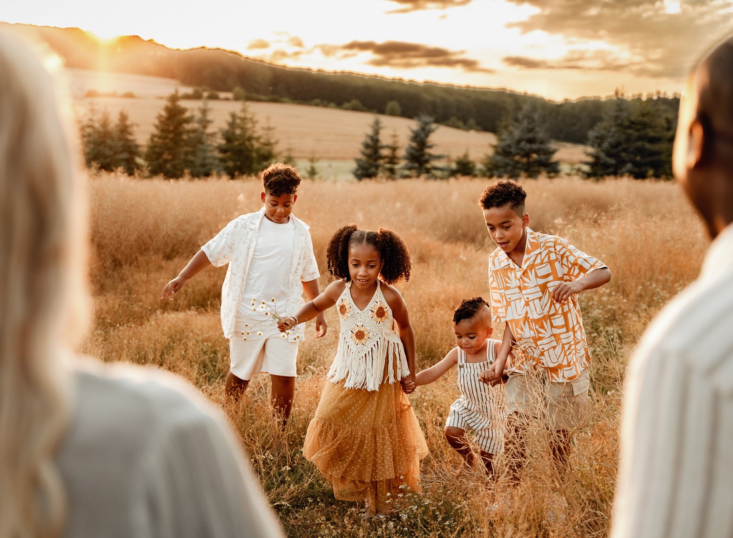 emotive-storytelling-summer-session-of-young-mixed-family-with-young-kids-at-sunset-in-german-country-side-in-ramstein-kmc-by-sarah-havens (5).jpg