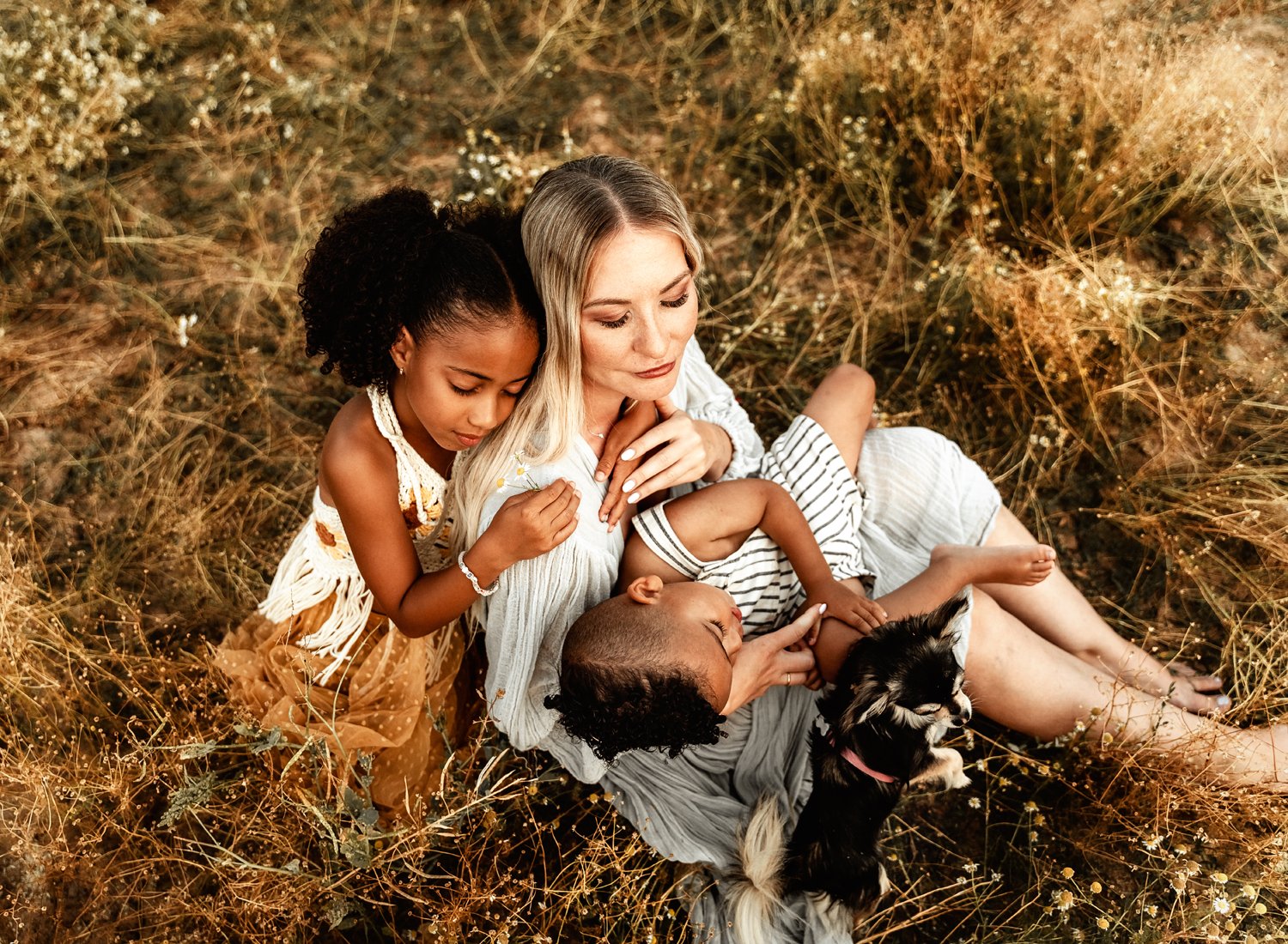 emotive-storytelling-summer-session-of-young-mixed-family-with-young-kids-at-sunset-in-german-country-side-in-ramstein-kmc-by-sarah-havens (16).jpg