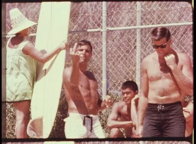 Setting an insubordinate tone, a blow up of Miki Dora from a vintage film still welcomed visitors with his Malibu salute. &nbsp;&nbsp;